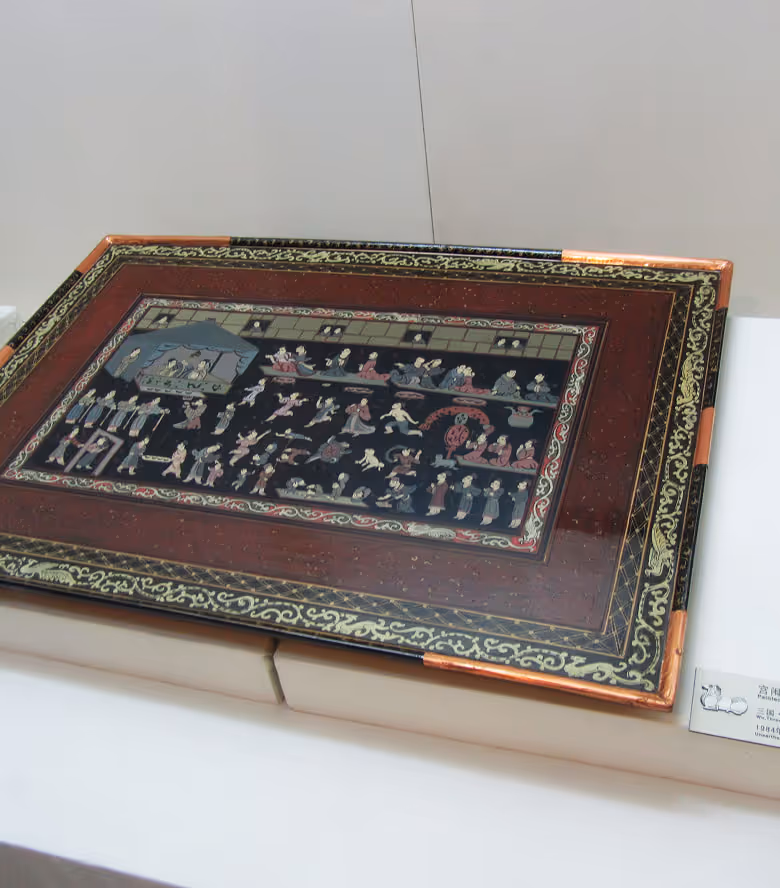Black lacquered mirror back with four phoenixes, Tang dynasty